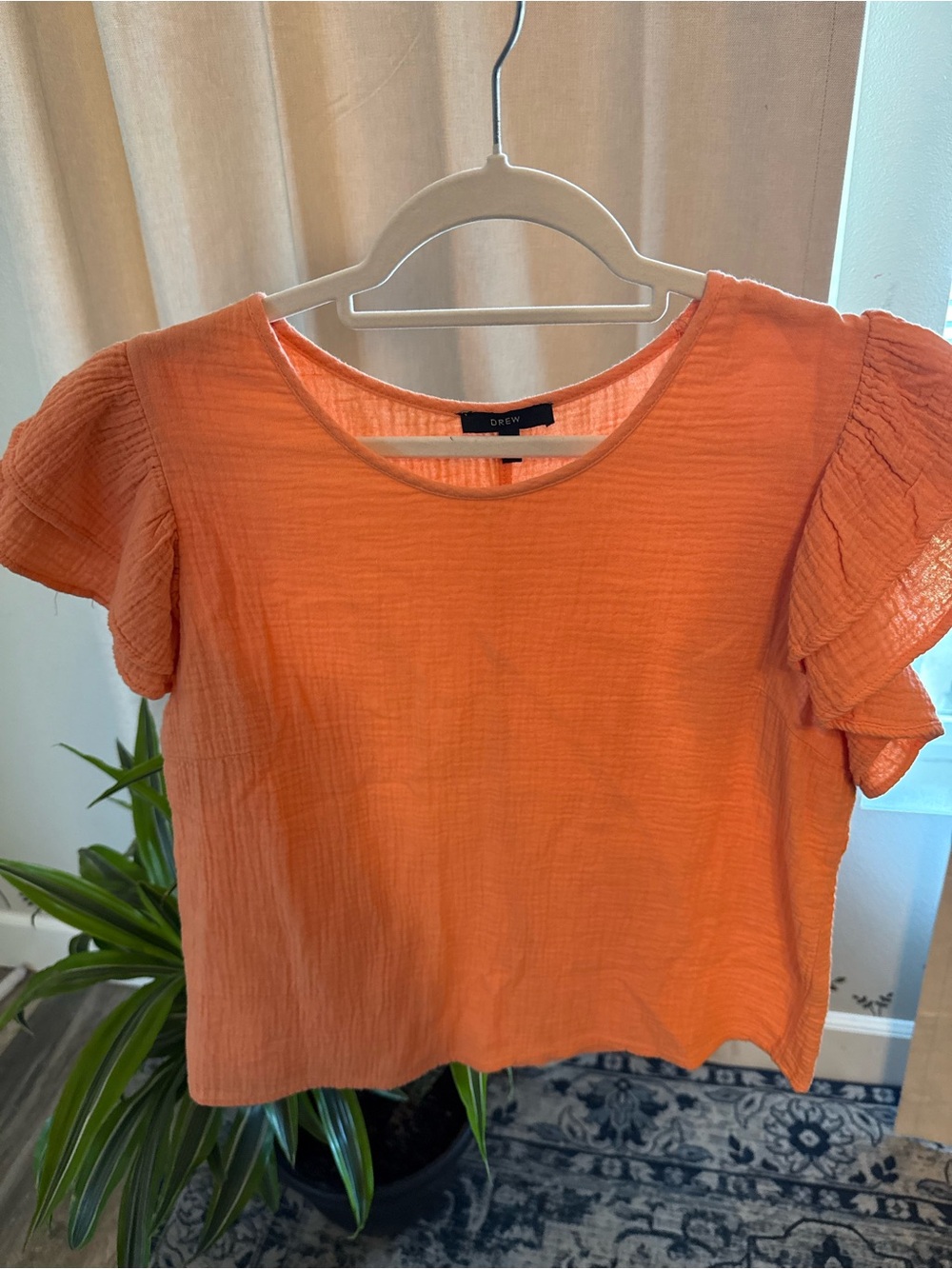 An Anthropologie 100% cotton DREW top